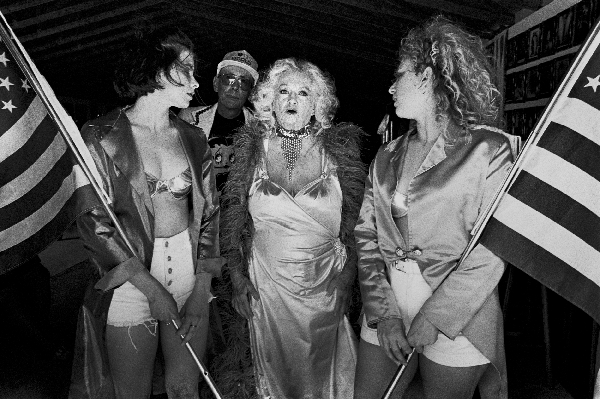Dixie Evans, 71, a former burlesque dancer and the proprietor of the Burlesque Hall of Fame and Historical Museum, prepares to hit the stage at the 41st Annual Striptease Reunion and Miss Exotic World Contest. (Helendale, CA, 1998)