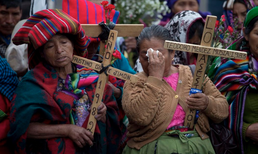 Mayan women protesting human rights crimes against their people from 1960-1996