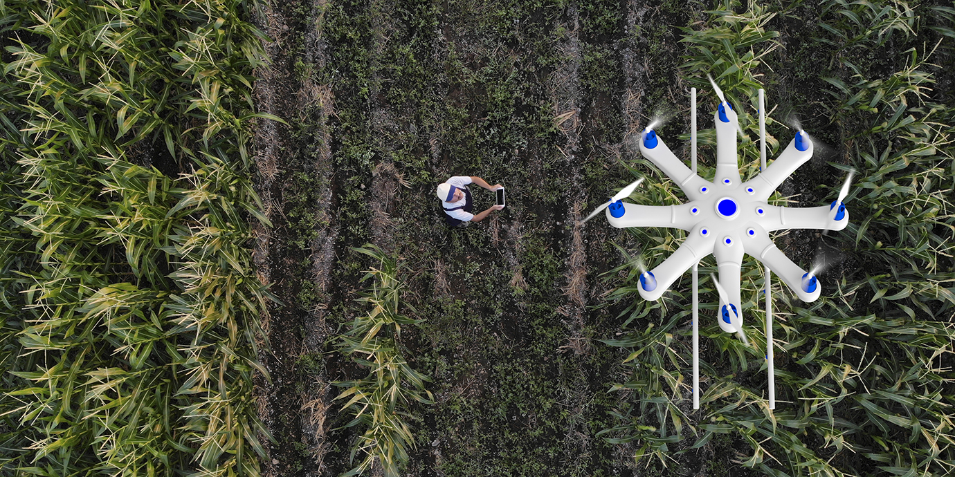 Farmer spraying his crops using a drone
iStock-1128102492