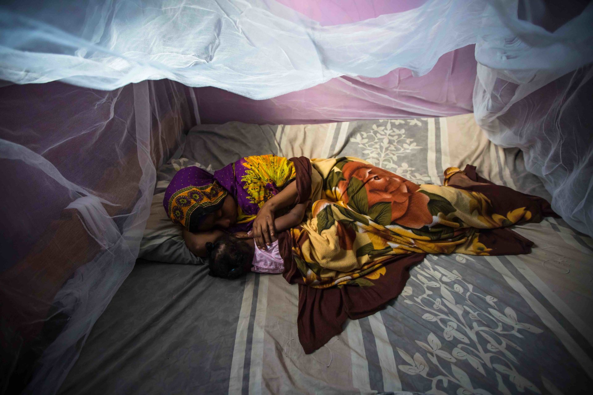 Habiba Suleiman, 29, a district malaria surveillance officer in Zanzibar, naps with her little girl Rahma under a mosquito net. She lives with her husband and their three children in Tanzania, where an estimated 60,000-80,000 people die from malaria each year. Hariba is working to change that and create a malaria-free future for her kids. She visits about six houses in her community a day, testing potential malaria patients, providing treatments when necessary, recording information about the malaria prevention measures they’ve taken, and educating them on how to best protect their families. Her efforts are supported by a USAID-provided motorcycle, mobile phone and tablet to make her efforts more effective. Hariba takes pride in her work: “In life, health is important over everything.”
Morgana Wingard, USAID