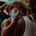 small boy with a mask during the covid-19 pandemic in poverty