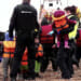 migrants brought ashore