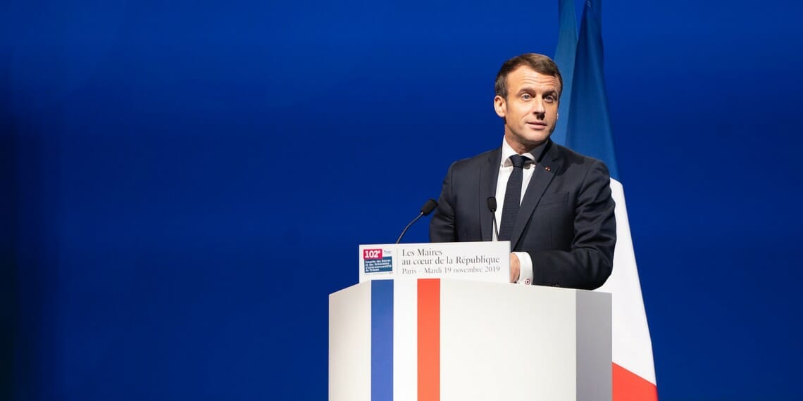 A person standing at a podium