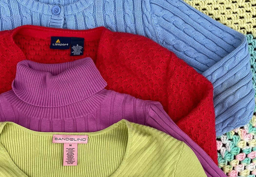 thrifted sweaters