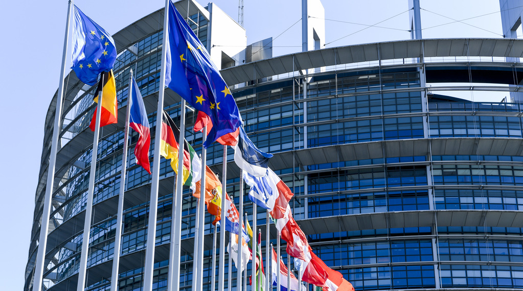 Flags waving in front of the European Parliament in Strasbourg