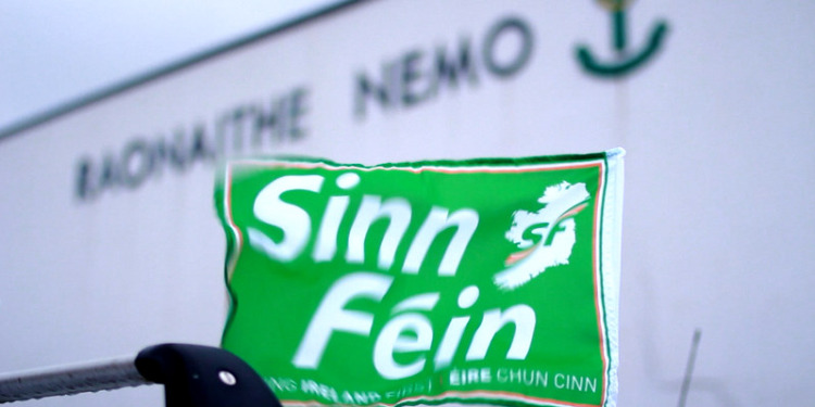 In the Photo: Sinn Féin Flag
Photo Credit: Flickr