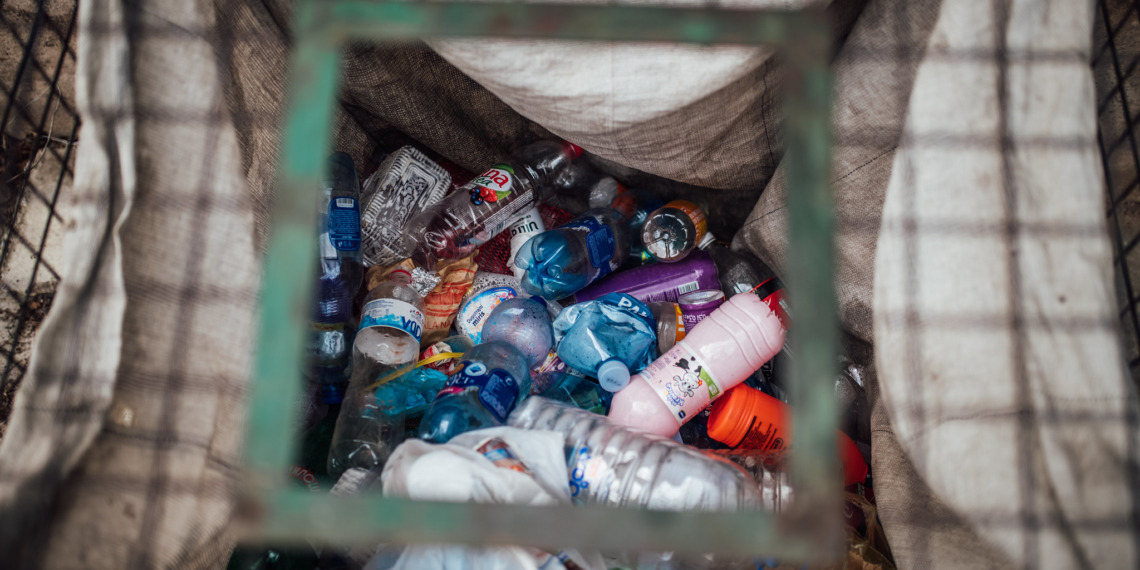 Plastic bottles in plastic only recycling bin.