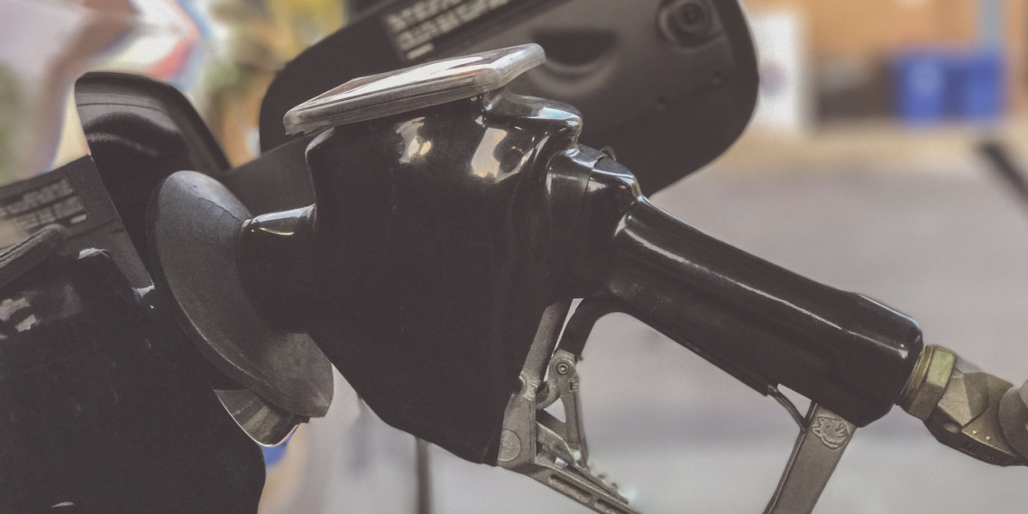 Pumping gas at a gas station located in Plymouth, Minnesota.