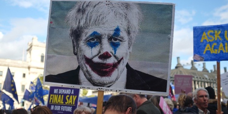 A picture of Boris Johnson dressed up as the joker, meant to symbolise the foolish way he led the UK into the economic downturn which has caused strikes