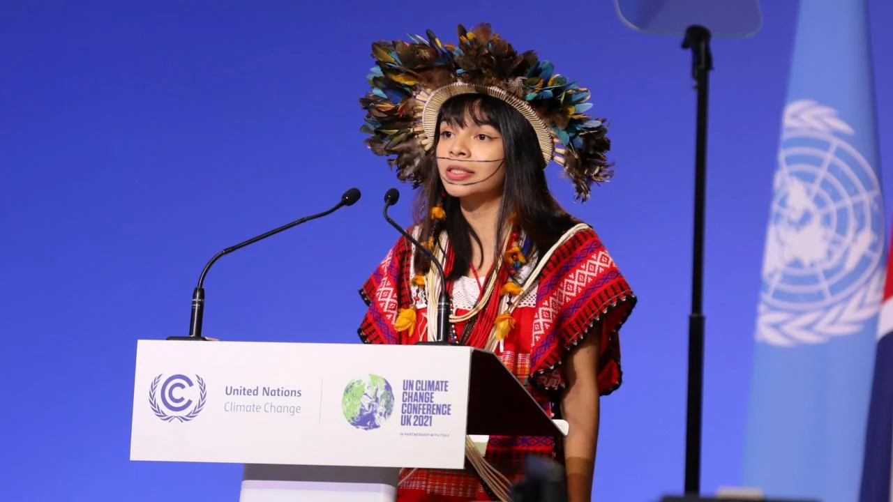 Txai Suruí, founder and coordinator of the Movement of Indigenous Youth of Rondônia, Brazil, addressing world leaders at the Glasgow Climate Change Conference in 2021.