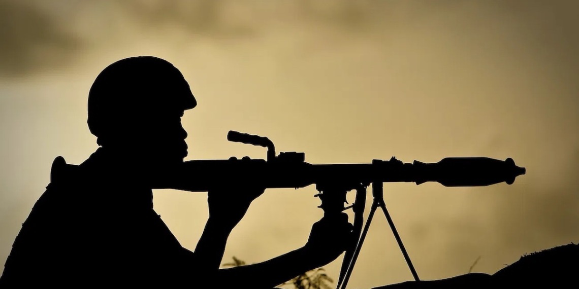 A Ugandan soldier of 341 Battalion serving with the African Union Mission in Somalia (AMISOM) holds a rocket-propelled grenade at sunrise 30 April 2012, on the frontline near the main road on the northern edge of Maslah Town, the northern city limit of the Somali capital Mogadishu.

More:

 AMISOM troops, now numbering 11,400 out of a mandated total of 17,731, supporting forces of the Transitional Federal Government have driven the Al-Qaeda-linked extremist group Al Shabaab out of the Somali capital where life is returning to the seaside city after years of conflict and Somalis are enjoying the longest period of relative peace not experienced since 1991. AU-UN IST PHOTO /STUART PRICE. Original public domain image from Flickr