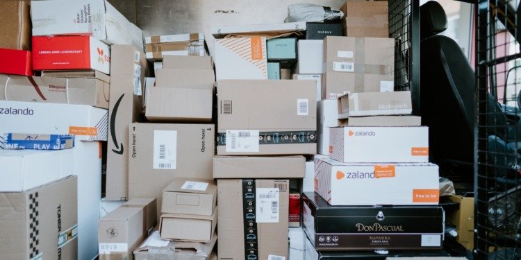 A stack of shipping boxes, including some from Zalando.