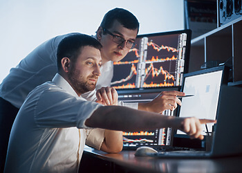 Team of stockbrokers are having a conversation about CFD