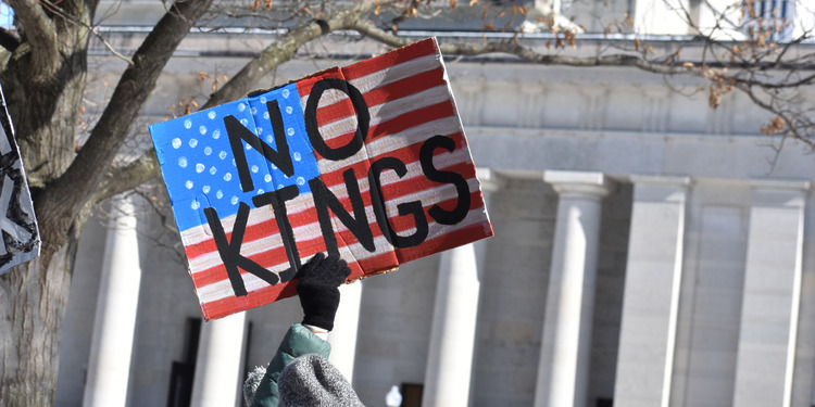 Protester holding a "No Kings" sign during a 50501 movement protest in the Capitol Square, Columbus, Ohio, February 17, 2025.