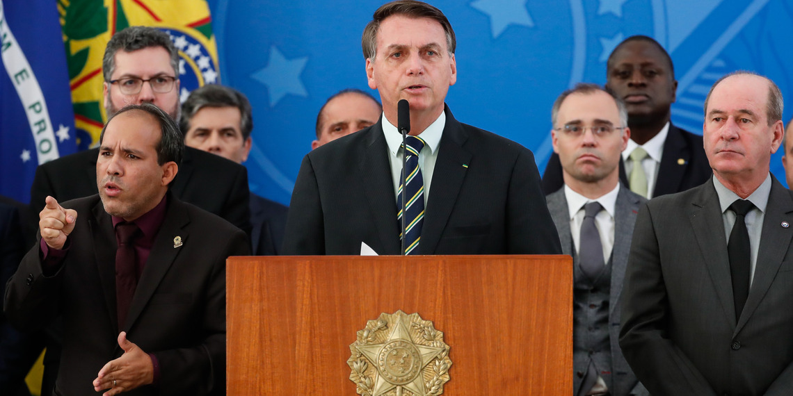 Governments around the world are engineering ‘information scarcity’ to escape democratic accountability. In Brazil during the COVID-19 pandemic, the administration of former President Jair Bolsonaro (centre) halted the publication of key health statistics. Photo Credit: Alan Santos/PR.