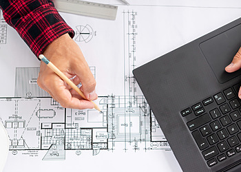 Construction Planning: Top view architect working on his project