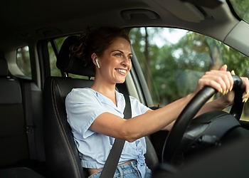 Woman driving her car