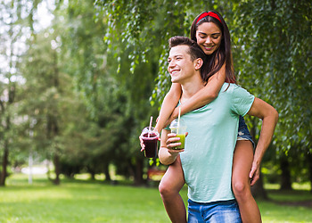 A couple jogging in the park with a healthy life coupled with alcohol addiction treatment is key