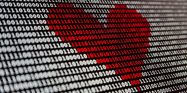 A red heart composed of binary code