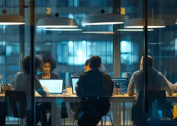 Jira Cloud Connector business users in a meeting room.