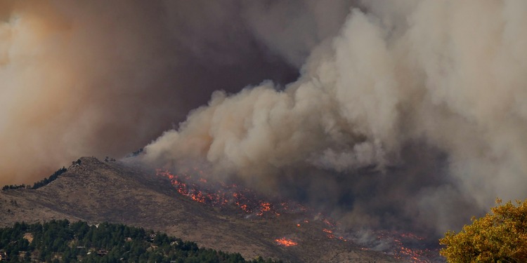 Wildfire burns on a mountain