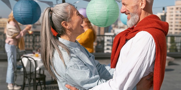 A woman and a man, displaying their senior independence