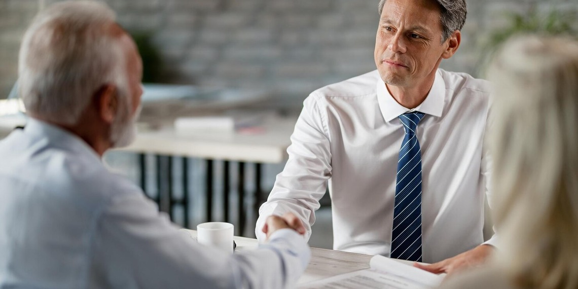 Assault Defense Lawyer meeting his clients.