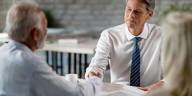 Assault Defense Lawyer meeting his clients.