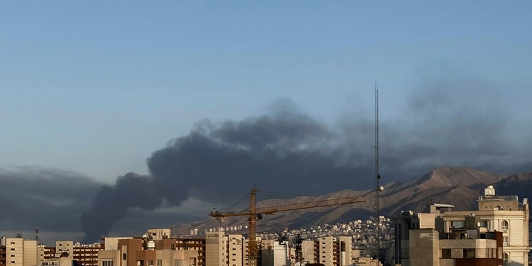 Smoke rises over Tehran following an Israeli attack on June 15, 2025