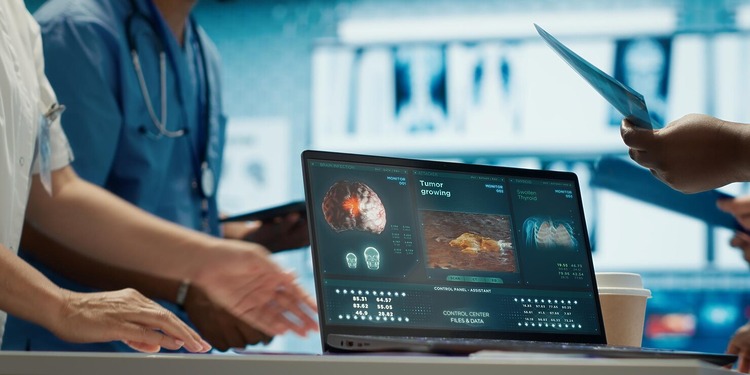 Laptop with a Healthcare Software on display.