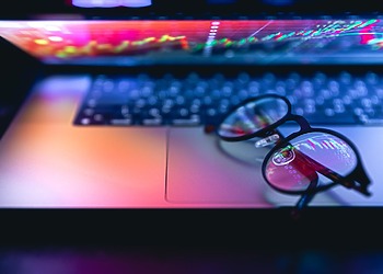 Computer screen showing Solana and other crypto graphs