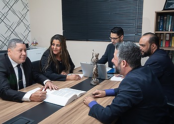 A team of 5 legal protection lawyer in a meeting