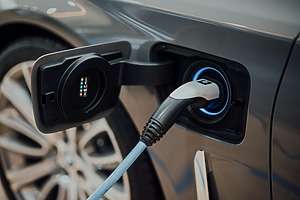 ESG news regarding China and India expanding green hydrogen production with state support, UK easing EV charging rules to boost home electrification and cut energy costs, Queensland funding renewable diesel project to strengthen fuel security, and Welsh farmers suing energy developer over pylon route and biosecurity allegations.