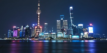 ESG news regarding China and India expanding green hydrogen production with state support, UK easing EV charging rules to boost home electrification and cut energy costs, Queensland funding renewable diesel project to strengthen fuel security, and Welsh farmers suing energy developer over pylon route and biosecurity allegations.