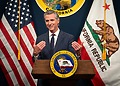 ESG news regarding Governor Gavin Newsom signs order to protect workers from AI, global GDP forecasts cut amid Iran-US-Israel conflict, EU launches a new waste tracking system, and TotalEnergies partners with Czech EPH