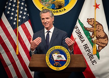 ESG news regarding Governor Gavin Newsom signs order to protect workers from AI, global GDP forecasts cut amid Iran-US-Israel conflict, EU launches a new waste tracking system, and TotalEnergies partners with Czech EPH