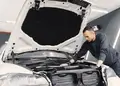 Mechanic check the Catalytic Converter