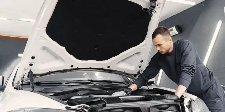 Mechanic check the Catalytic Converter