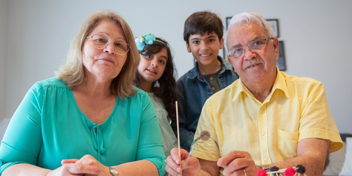 Three generations of a family in a sustainable home