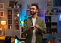 Man checking his room electrical appliances and lights