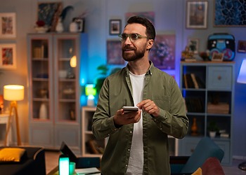 Man checking his room electrical appliances and lights