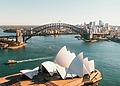 ESG news regarding Australia’s lawsuit against 3M over PFAS contamination, economic risks linked to extreme heat in Germany, TotalEnergies’ offshore wind expansion in Normandy, and a U.S. safety probe into Rivian electric vehicles.