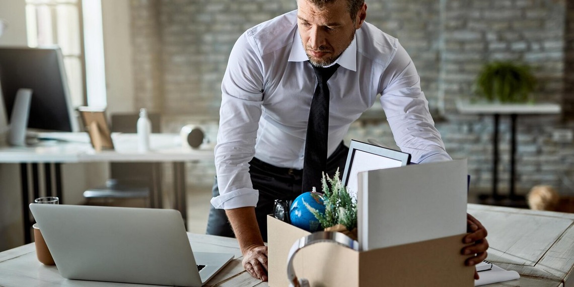 a male, at his office, after receiving wrongful termination