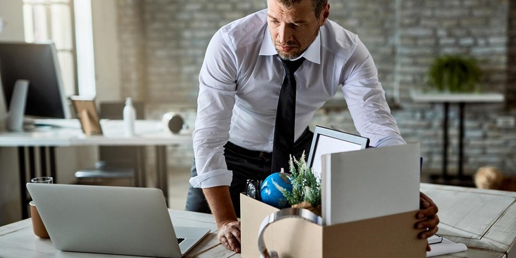 a male, at his office, after receiving wrongful termination