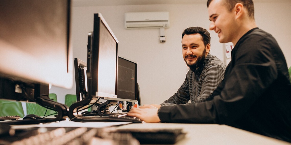 Two Developers doing tech Support