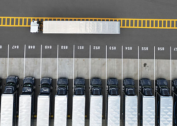 Delivery trucks at loading site