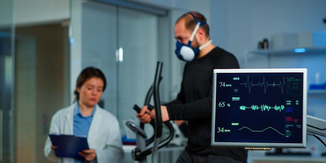Healthcare professionals reviewing cardiac monitoring data during a cardiovascular assessment to support coordinated heart care.