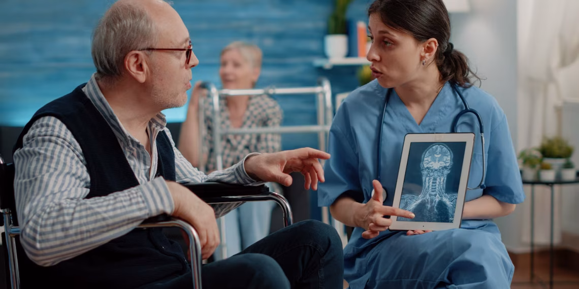 Healthcare professional discussing dementia symptoms and awareness with an older patient and family members during a medical consultation.
