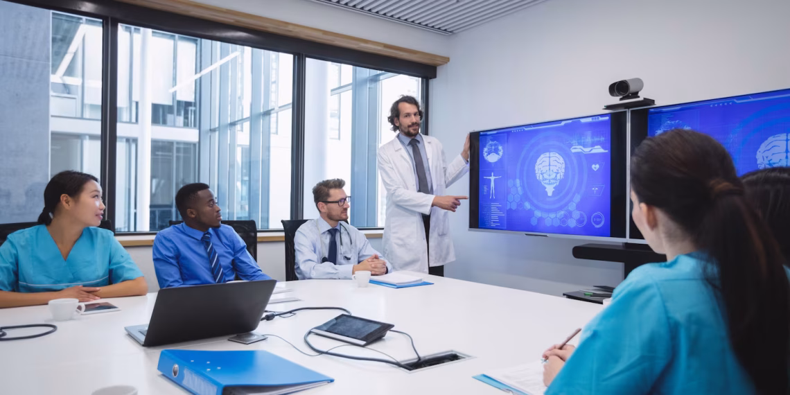 Healthcare professionals participating in a digital training session using a healthcare training platform for clinical education and compliance.