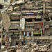 Venezuelan citizens search destroyed buildings in La Guaira, Venezuela